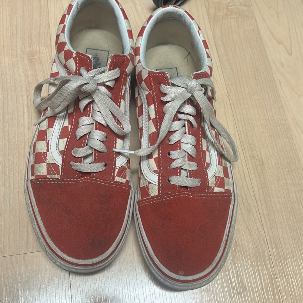 Size women’s 9.5 checkered red vans